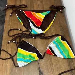 Reversible. Size S. Gently used. As is. Bikini. Brown and silver and multi color